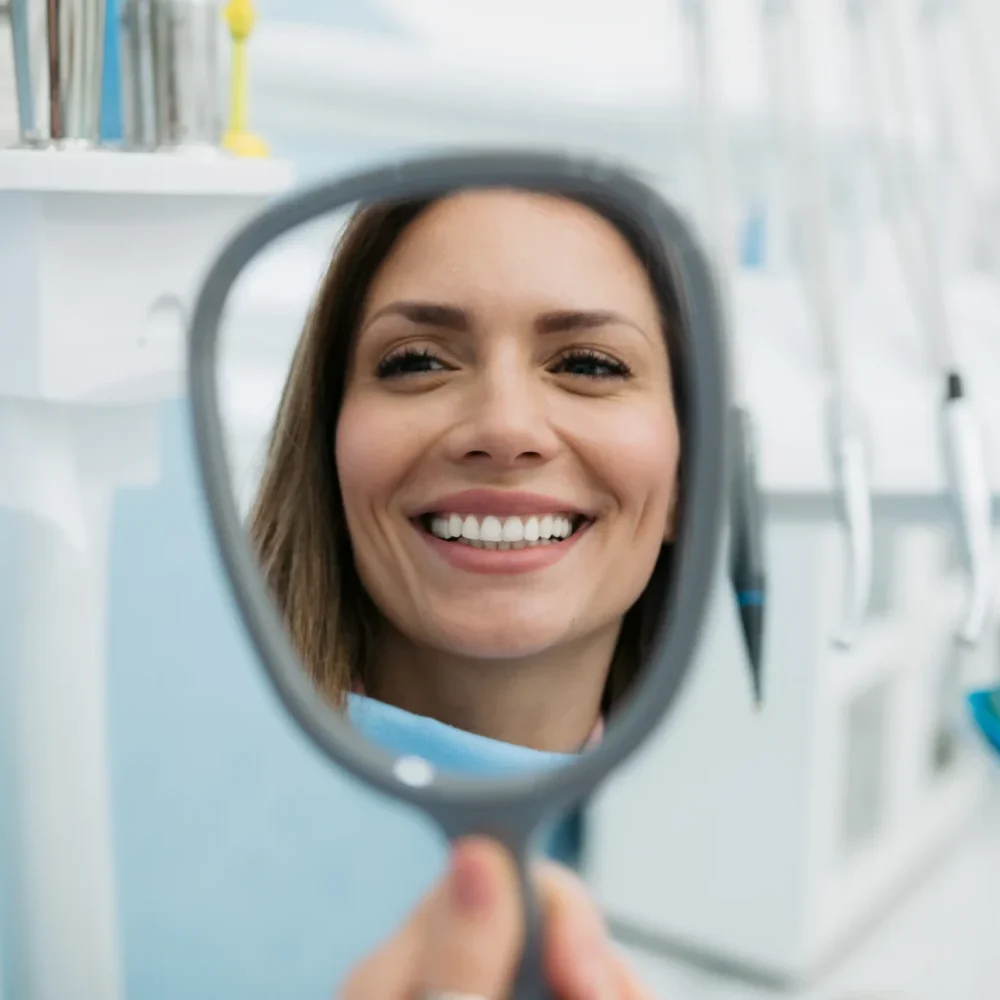 Woman Smiling After Professional Teeth Whitening