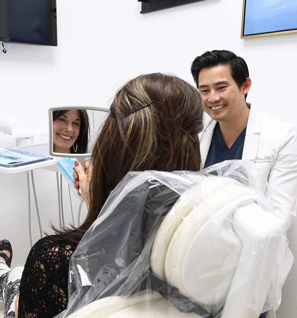 Dr. Tan Khuu smiling with dental patient