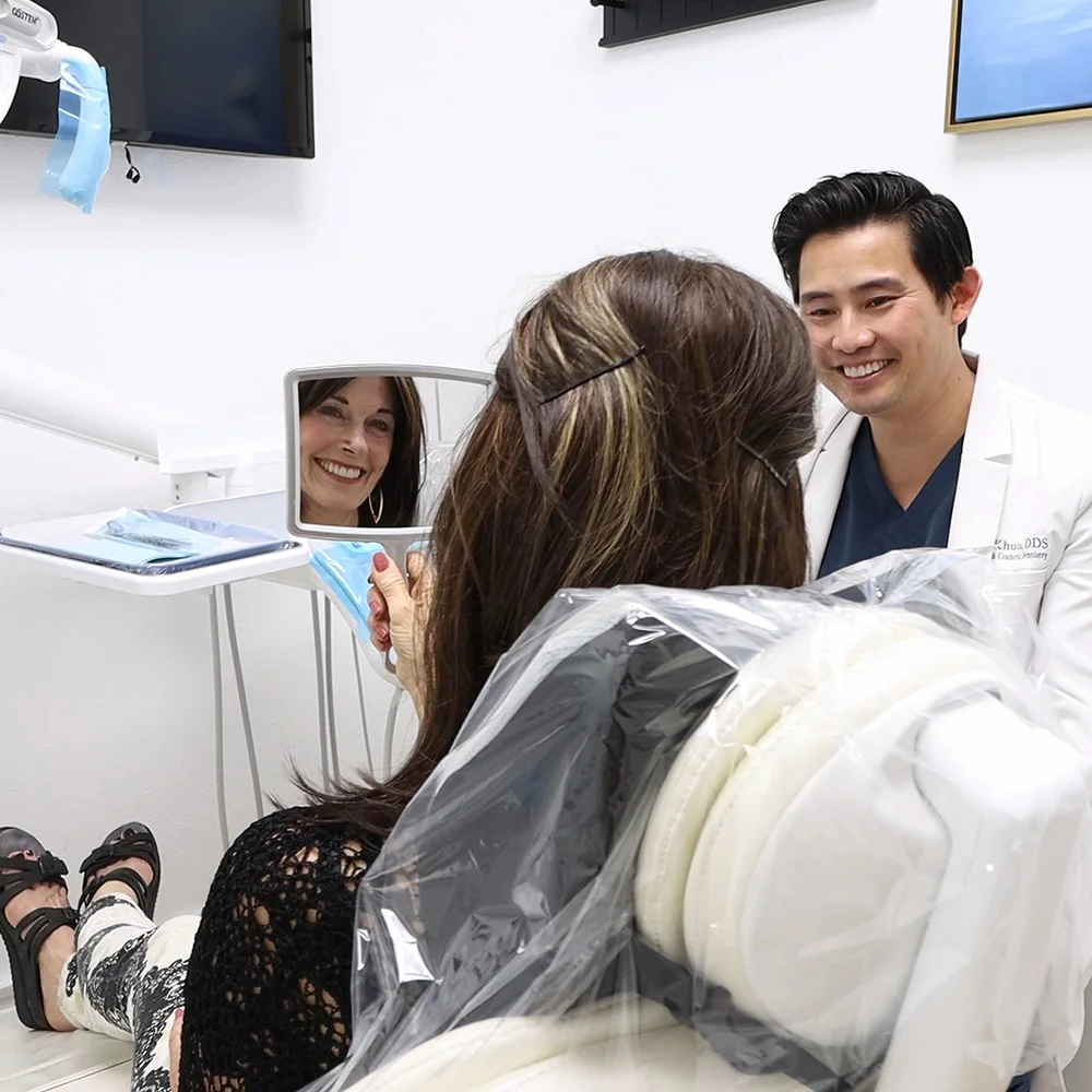 Dr. Tan Khuu Smiling With Dental Patient