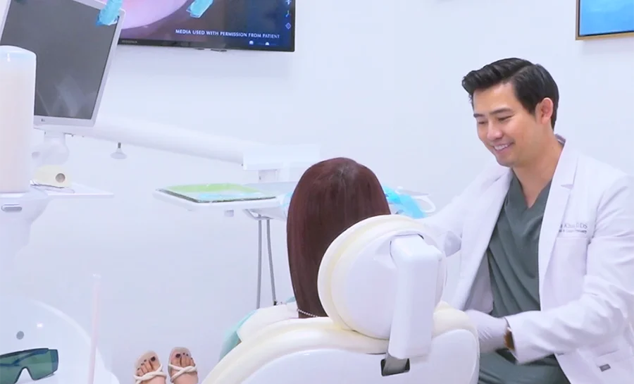 Garden Grove Emergency Dentist Dr. Tan Khuu With Patient